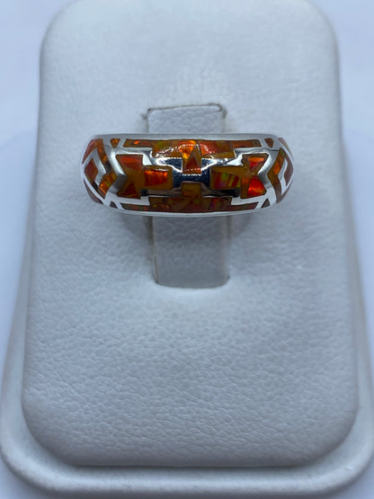 Anillo de plata .950 con ópalo de fuego naranja en estuche blanco, vista frontal