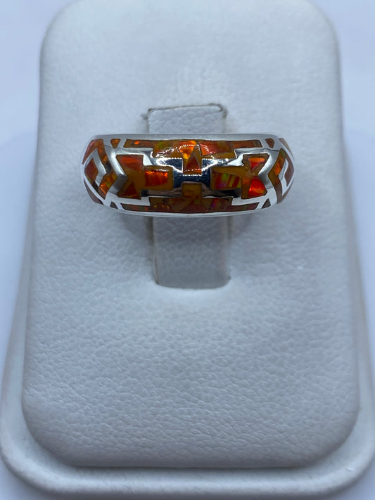 Anillo de plata .950 con ópalo de fuego naranja en estuche blanco, vista frontal