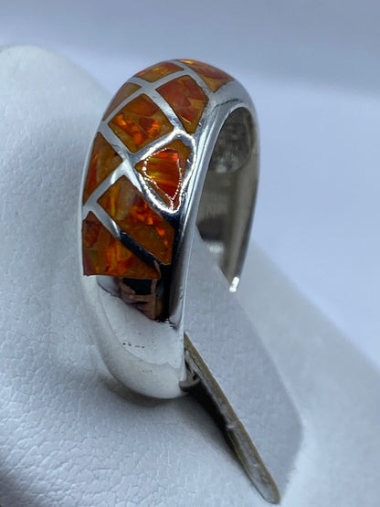 Anillo unisex en plata .950 con ópalo de fuego natural, usado en dedo