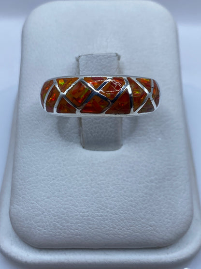 Anillo de plata .950 con ópalo de fuego naranja en diseño geométrico