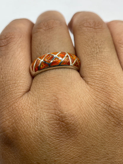 Anillo sobre fondo gris mostrando sello 950 MEXICO