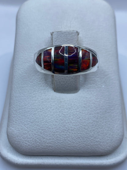 Anillo de plata .950 con ópalo de fuego multicolor en estuche blanco