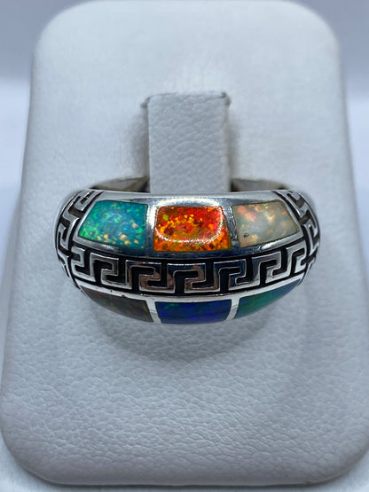 Anillo de plata .950 con ópalo de fuego multicolor en diseño étnico, talla 8