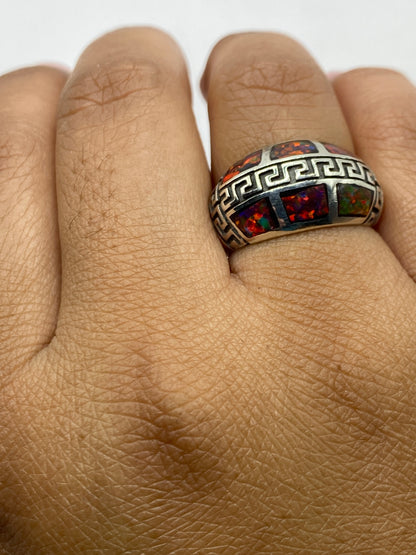 Anillo de ópalo fuego multicolor en plata .950 mostrando sello de autenticidad en el interior