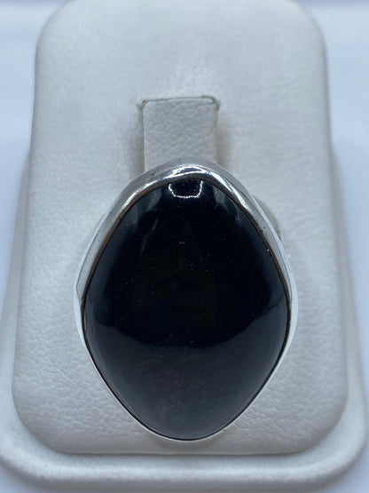 Anillo ajustable de plata .950 con onix negro pulido a espejo