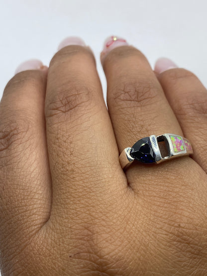 Anillo completo sobre fondo blanco mostrando el diseño combinado en plata de Taxco