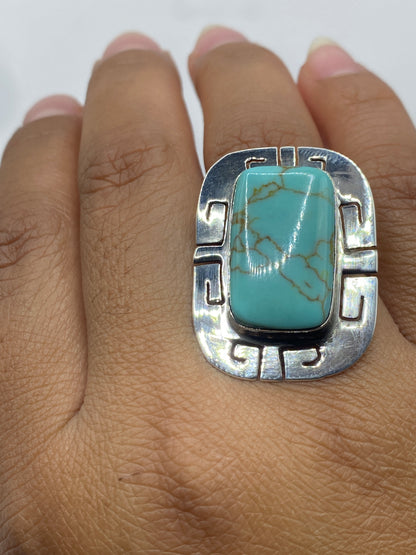 Anillo sobre fondo blanco con sello Quinto 925 visible, diseño geométrico completo