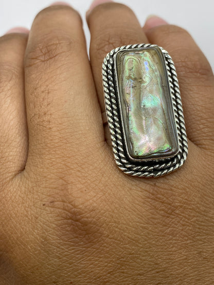 Anillo sobre báscula mostrando peso de 12.2 g