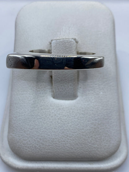 Anillo de plata cartoneado con volumen 3D, pulido a espejo, en talla 9
