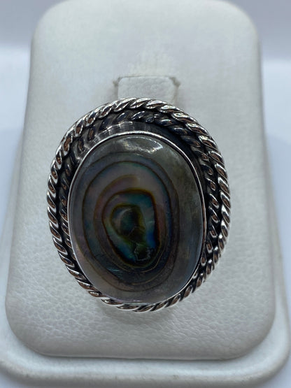 Anillo ajustable de plata .925 con piedra natural iridiscente en banda retorcida