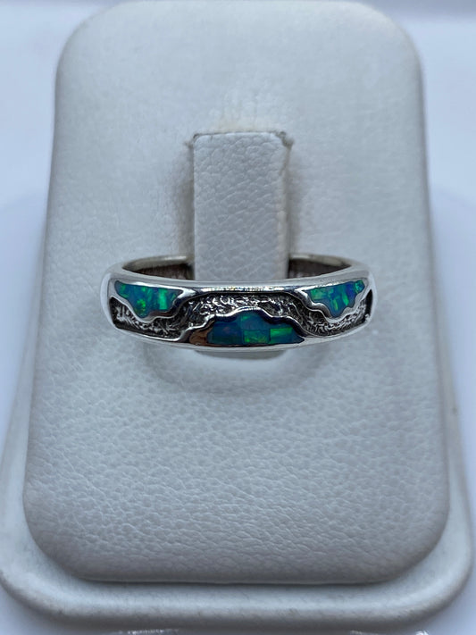 Anillo unisex de plata .950 con ópalo de fuego azul cielo en estuche blanco