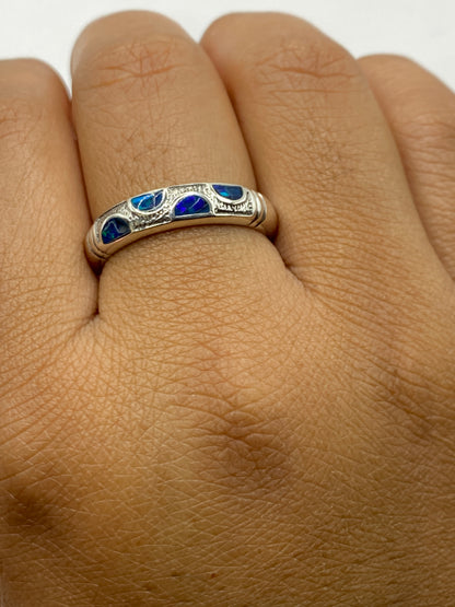 Anillo sobre fondo blanco mostrando el Quinto .950 en el interior