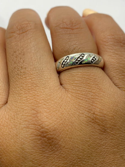 Reverso del anillo mostrando el Quinto 950 grabado en plata pura