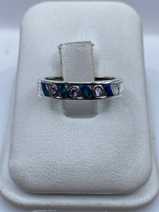 Anillo de plata .950 con Ópalo de Fuego azul, engaste visible en Taxco