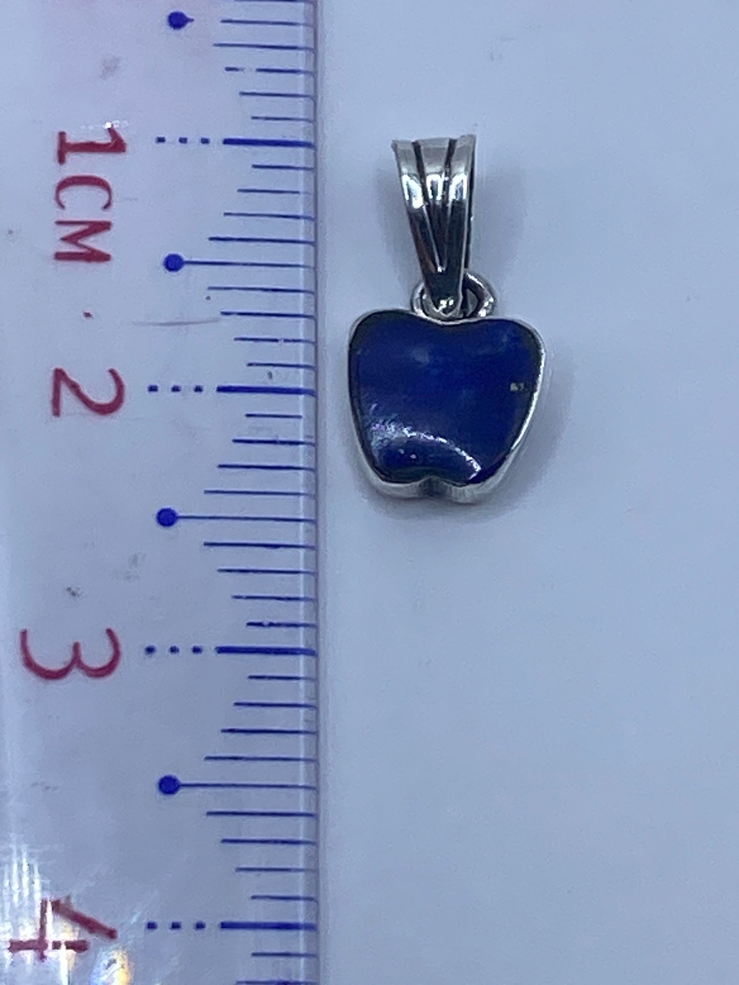 Dije de 2.3 cm con Quinto 925 grabado en el reverso
