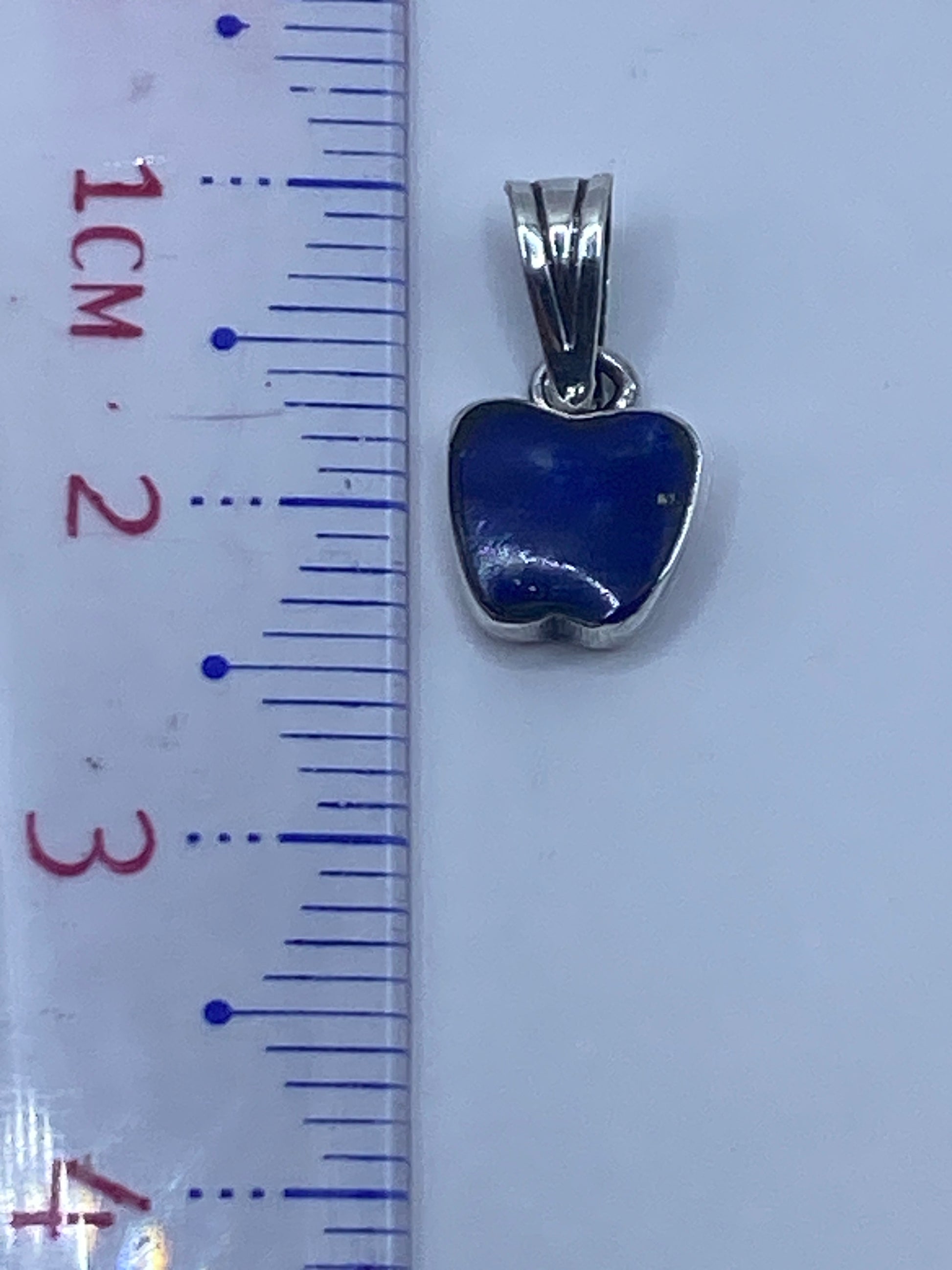 Dije de 2.3 cm con Quinto 925 grabado en el reverso