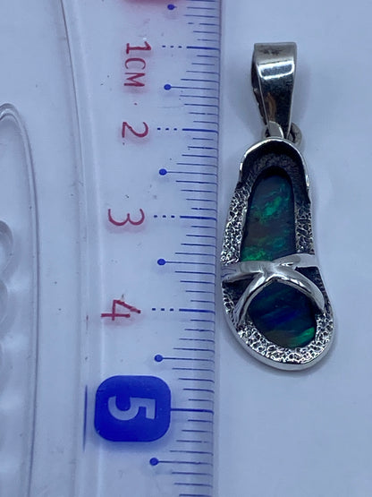 Dije sobre regla: largo total 4.3 cm, peso 2.6 gramos