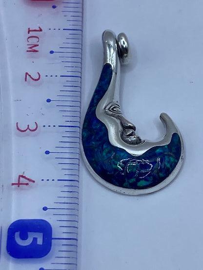 Dije de plata .950 con Quinto visible en la base