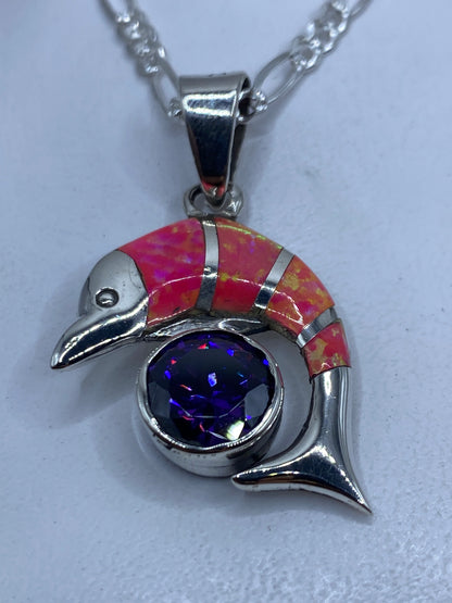 Dije escultural en forma de pájaro con ópalo de fuego rosa y plata .950 de Taxco