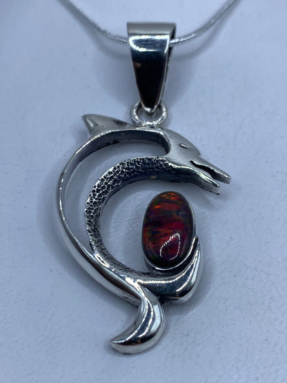 Dije serpiente de plata .950 con ópalo de fuego multicolor engastado a mano
