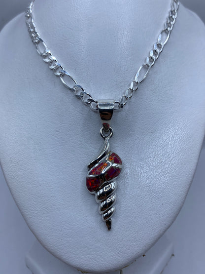 Detalle del ópalo de fuego rosa incrustado en la espiral de plata .950