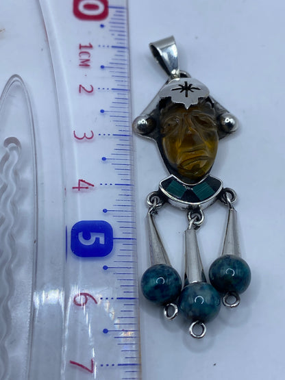 Dije en escala con regla de centímetros, confirmando 6.7 cm de largo total