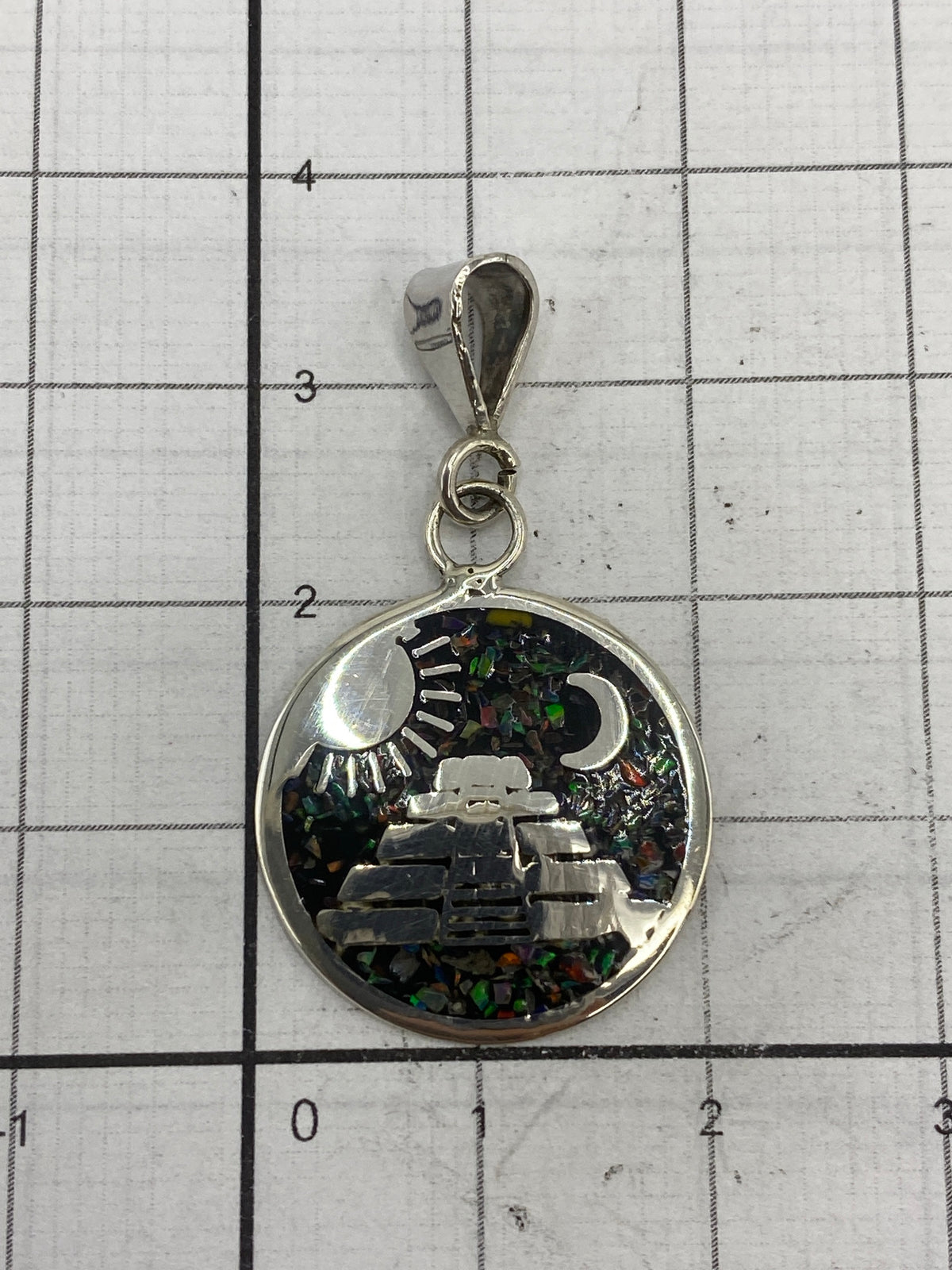 Reverso del dije con marcaje 925 MEXICO y gancho de plata