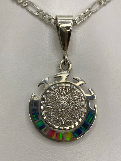 Reverso del dije mostrando el Quinto 950 y MEXICO TAXCO