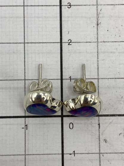 Reverso de los aretes mostrando el Quinto 925 en la plata