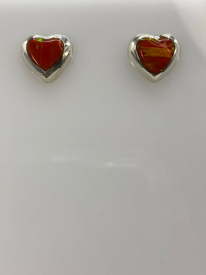 Aretes de plata 925 con ópalo de fuego desde atrás, mostrando el poste y tuerca