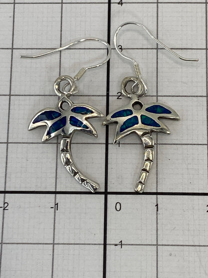 Aretes de plata 950 con Quinto visible en la base