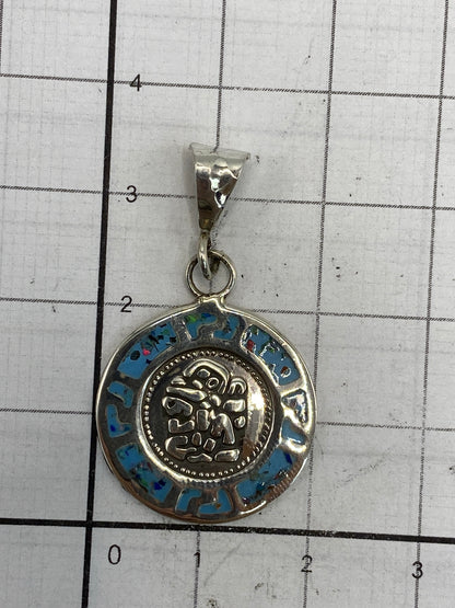 Reverso del dije mostrando el Quinto 925 y marca de Taxco