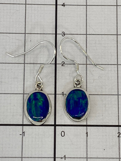 Reverso de los aretes con el Quinto 925 visible en la plata