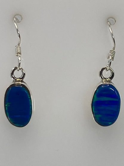 Aretes sobre medidor de centímetros, largo 2.5 cm