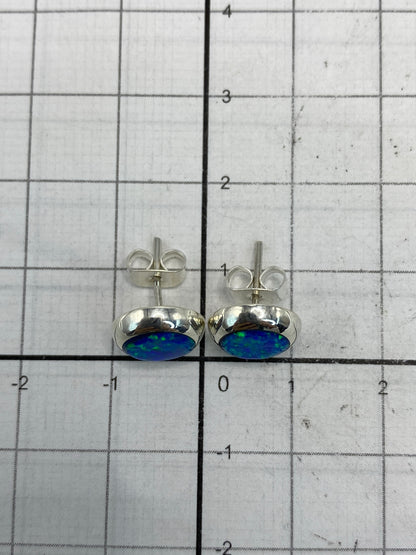 Arete sobre escala para referencia de tamaño — 1.3 cm de largo