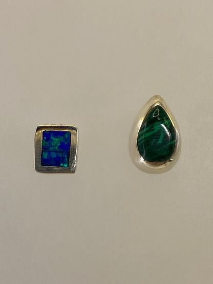Aretes de plata 950 con Opalo de Fuego verde olivo, luz natural