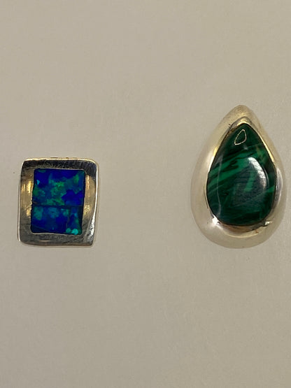 Aretes sobre regla mostrando medida de 1.3 cm