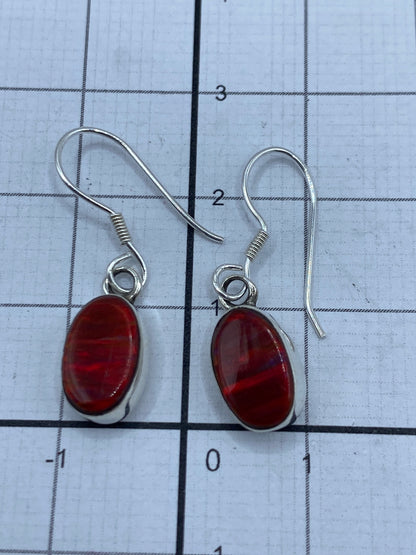 Aretes de plata 950 sobre regla de medición, largo 2.5 cm