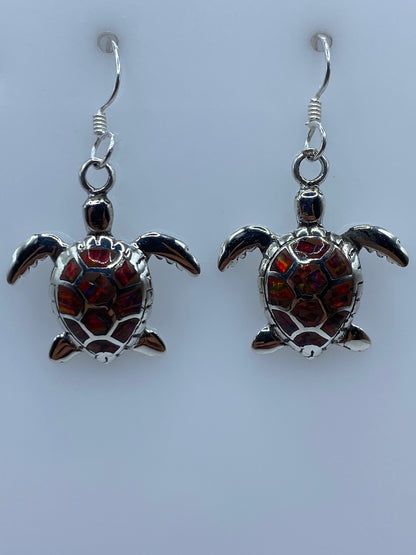 Detalle del ópalo de fuego con tonos rojo, naranja, amarillo y verde