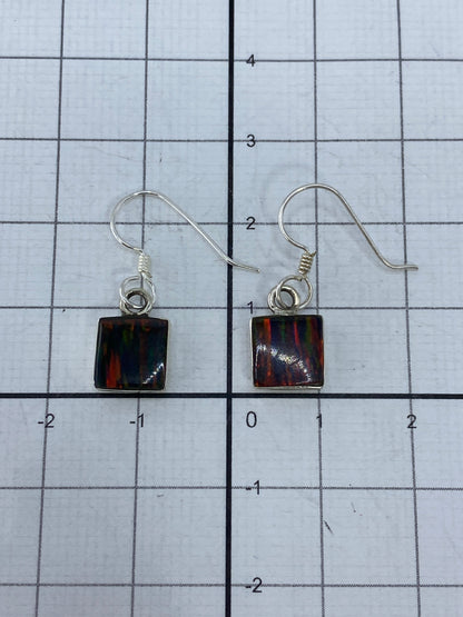 Pesaje de aretes en escala digital: 1.3 gramos el par