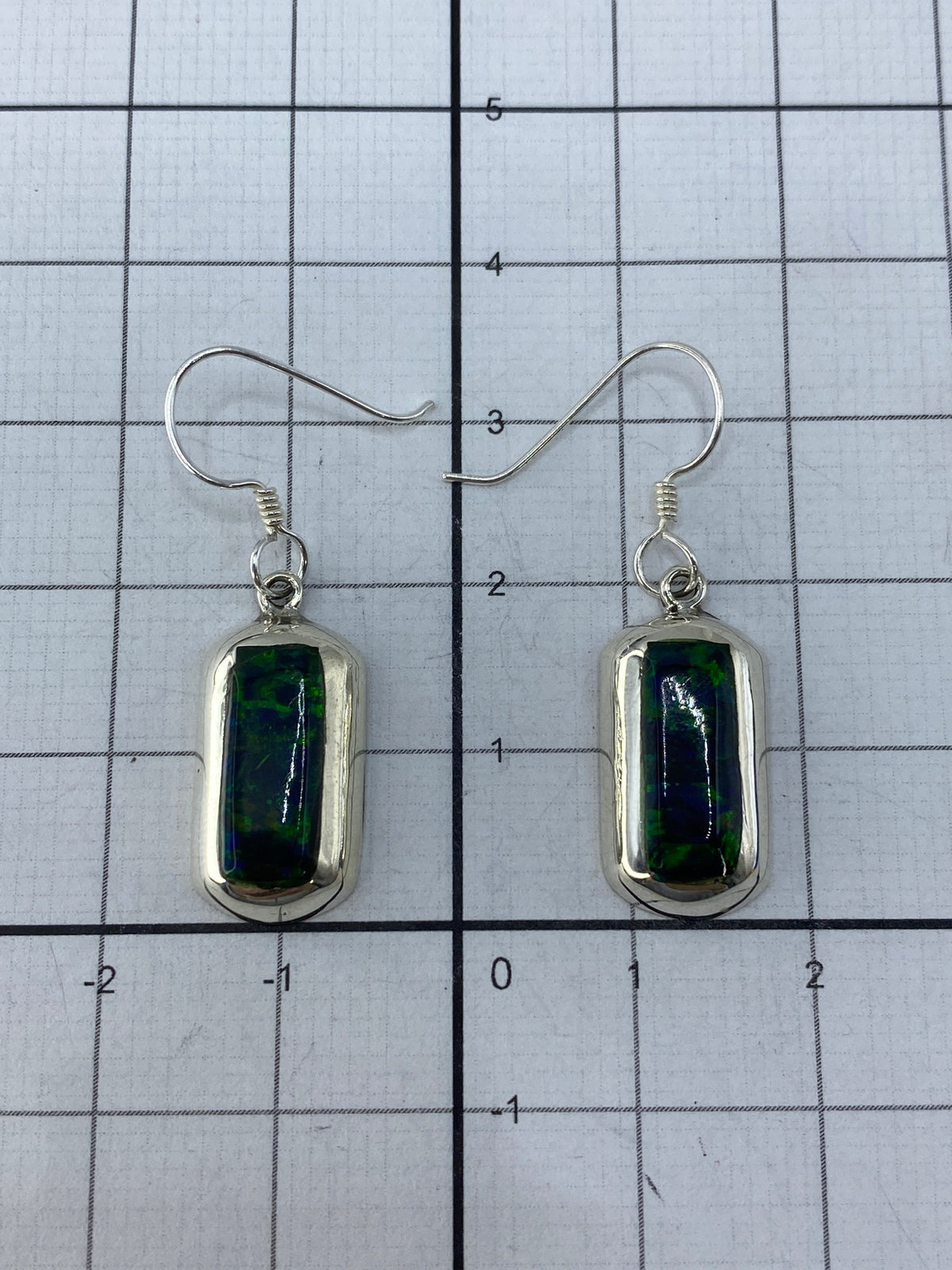 Aretes de plata 925 con Quinto visible en la base