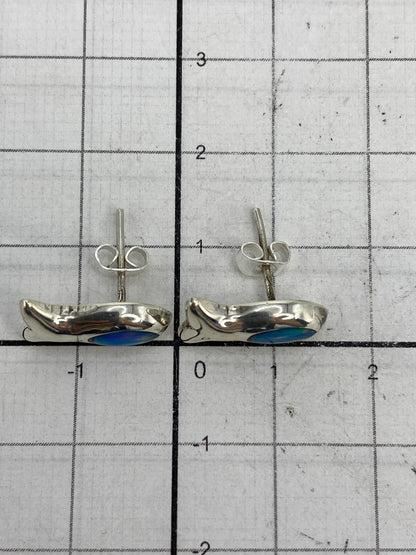 Aretes sobre fondo blanco con el Quinto 925 visible