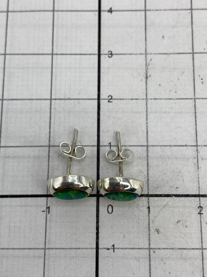 Aretes con Quinto 925 en el reverso, mostrando autenticidad
