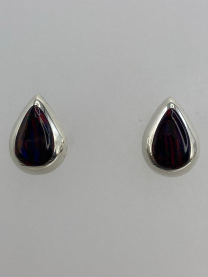 Aretes de opalo fuego con juego de luz rojo anaranjado