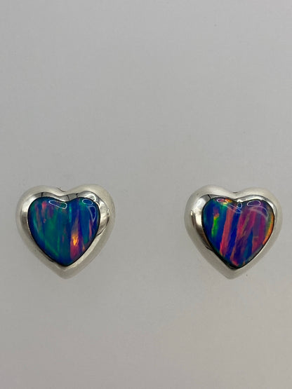 Aretes de plata Taxco en escala de medida mostrando 1.4 cm de largo