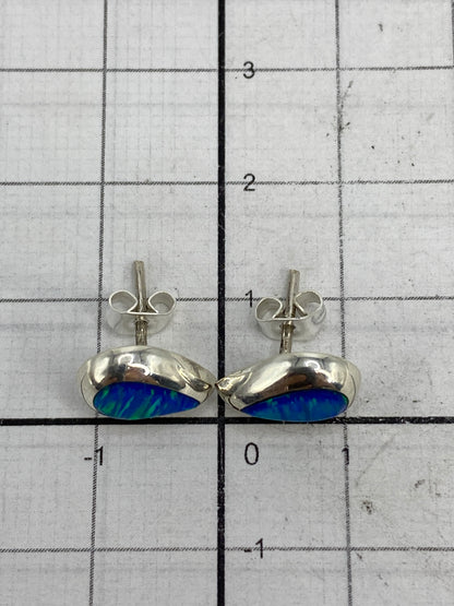 Reverso de los aretes mostrando sello 925 del Quinto