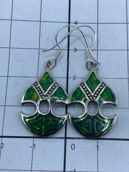 Aretes de plata pura 950 con certificado Quinto visible