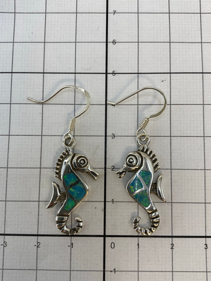 Reverse view showing the .950 hallmark and craftsmanship of each seahorse earring
