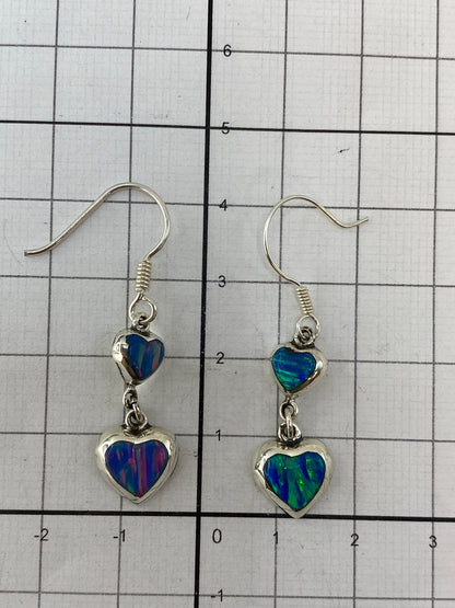 Reverse side of earrings showing .925 hallmark and polished silver finish