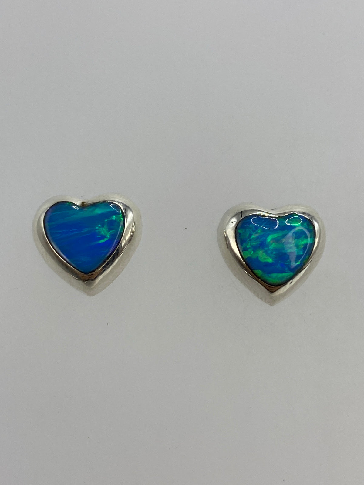 Par de aretes de plata 925 con opalo de fuego azul cielo engastados a mano